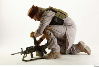 Photos Luis Donovan Army Taliban Gunner Poses charging gun kneeling…